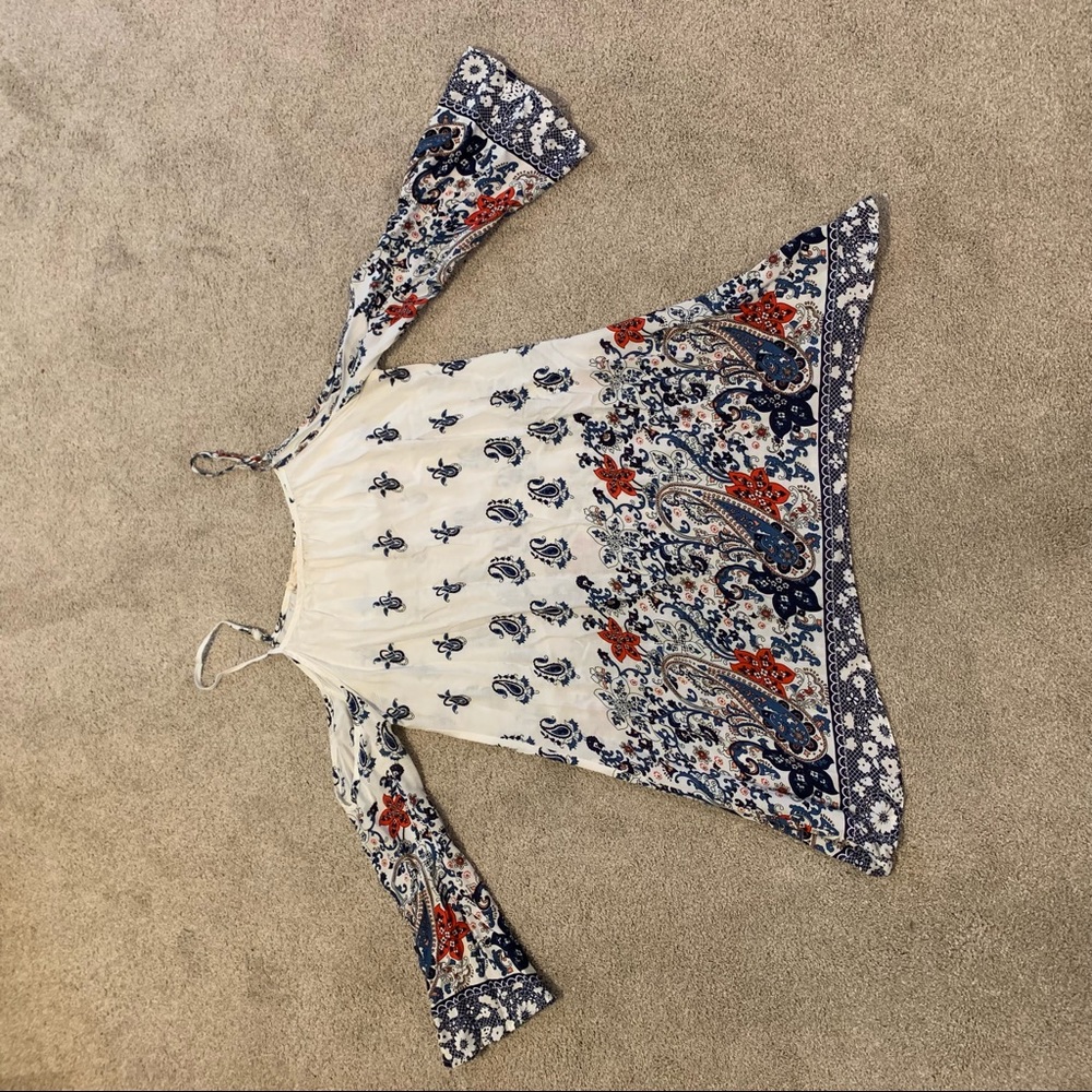 Cut away shoulder floral blouse